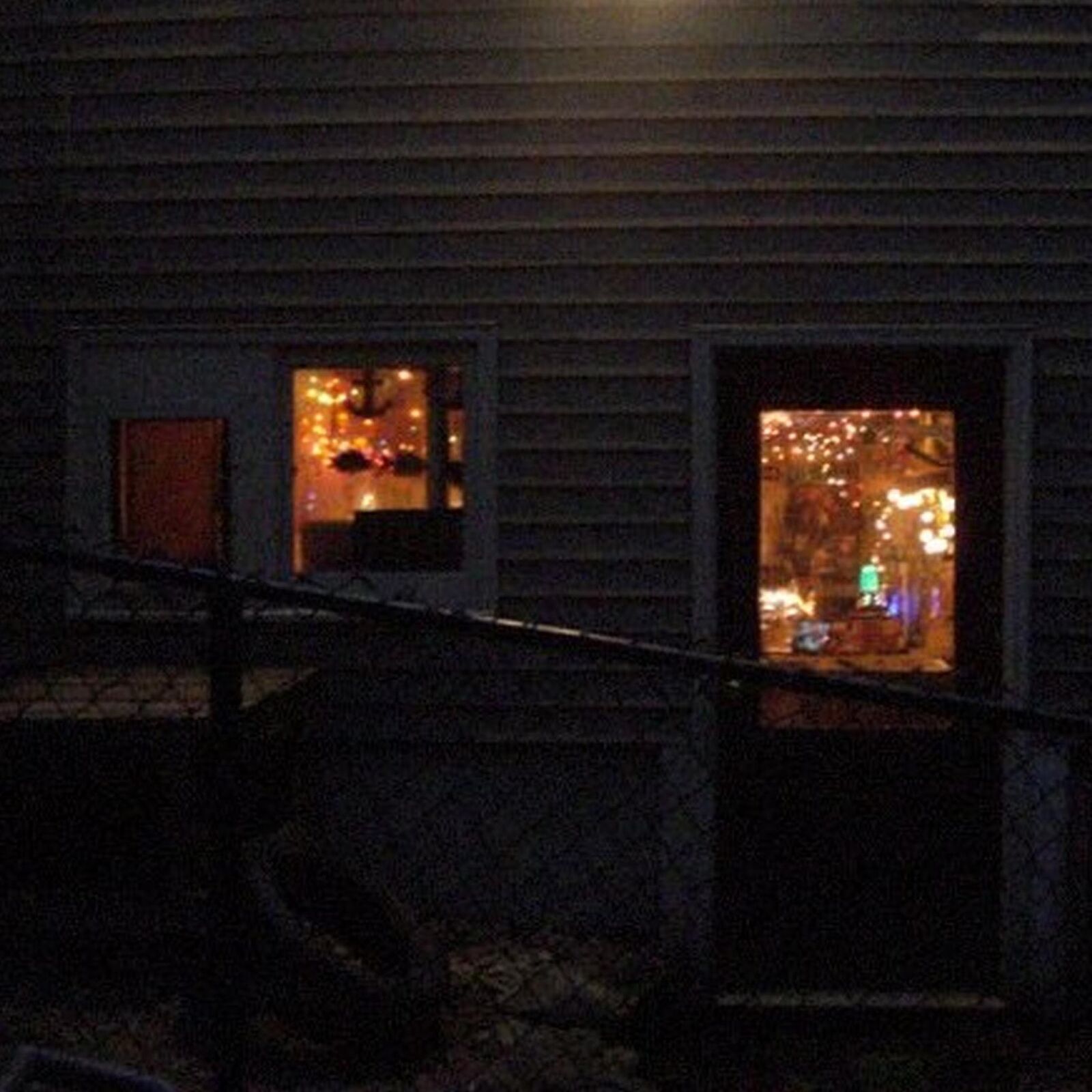 Frogwood Manor exterior at night